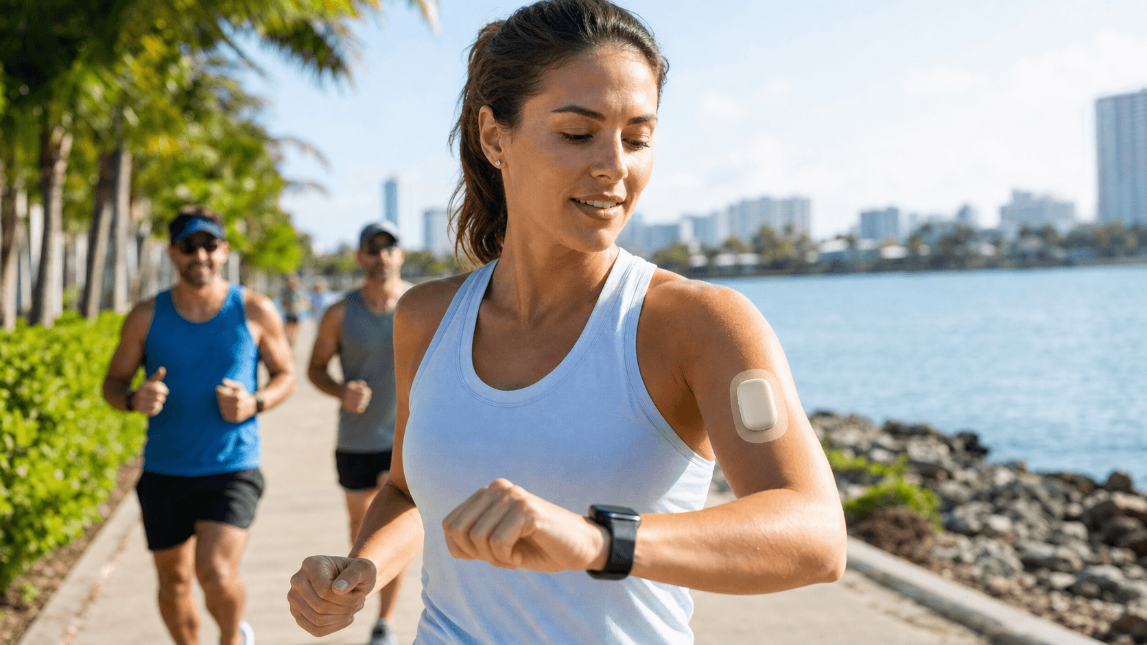 Athletic person in motion wearing a white Omnipod on arm, secured with a clear patch, bright outdoor light.